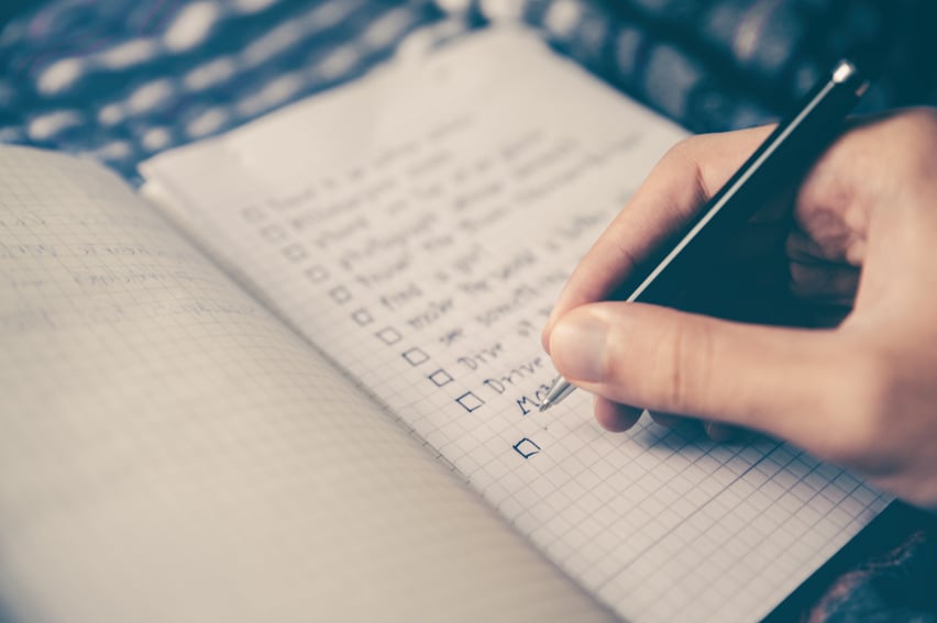 Writing Checklist on Notebook